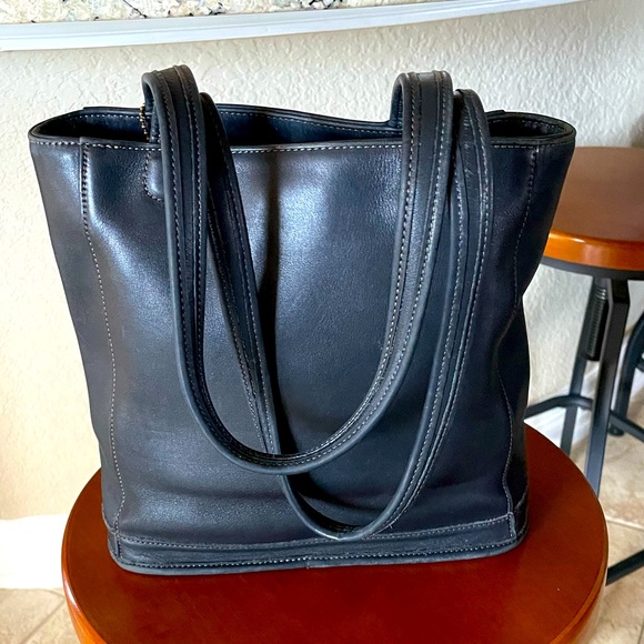 Coach Handbags - Vintage Black Coach Leather bucket purse.